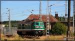 232 404 der Starkenberger Baustoffwerke GmbH abgestellt in Neustrelitz vor den Toren von Netinera am 11.07.2015
